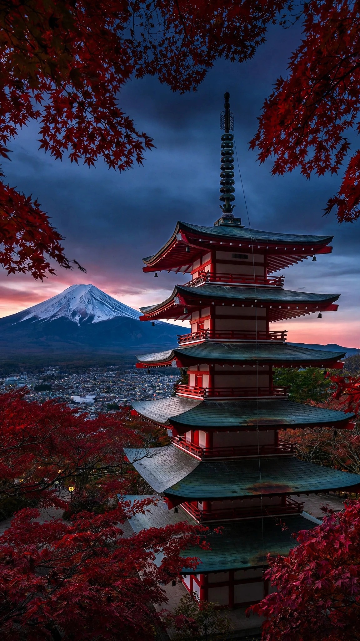 red pagoda with Mount Fuji and autumn maple leaves at dusk, vertical landscape wallpaper