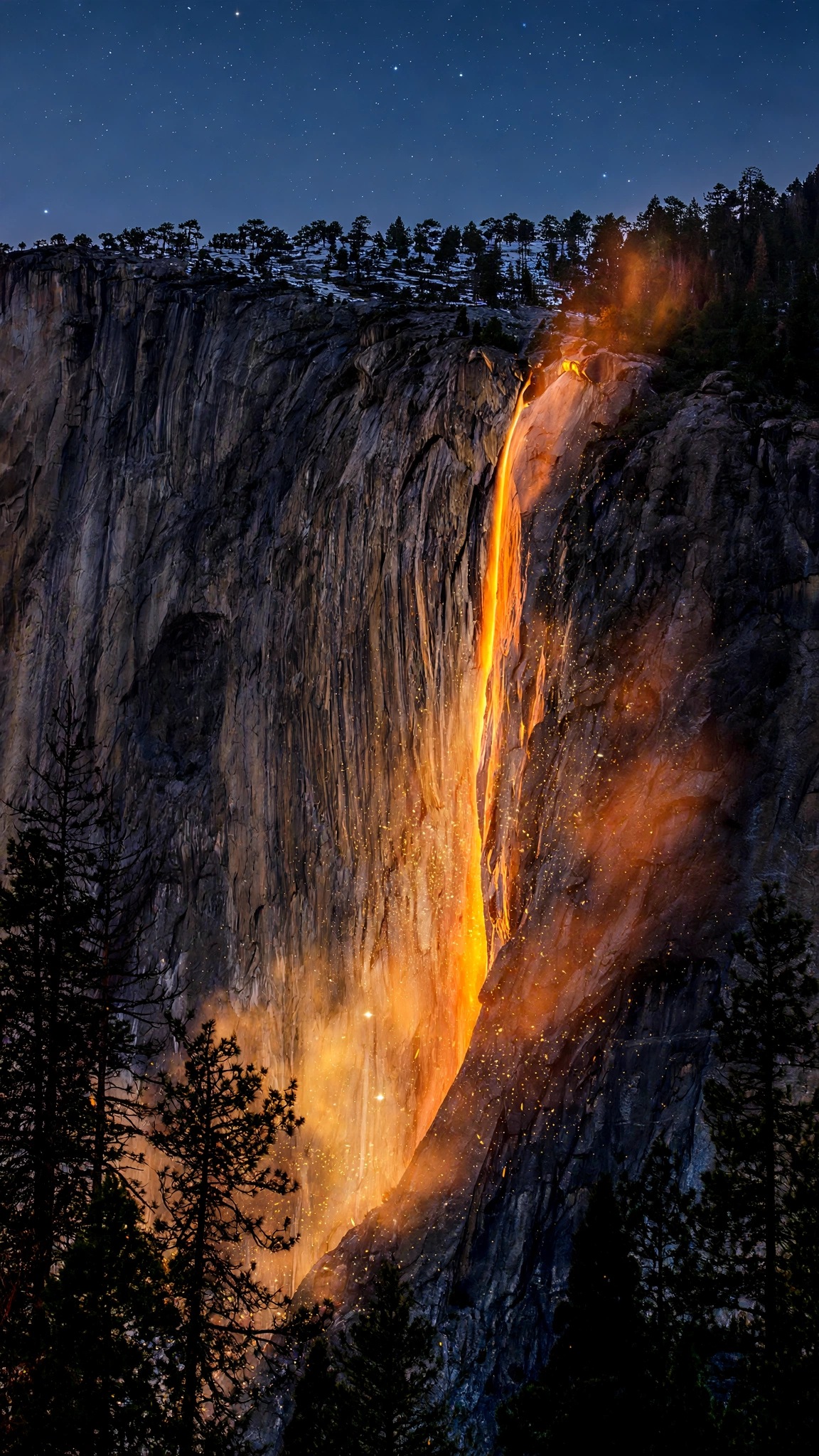 Horsetail Fall glowing like lava down El Capitan at dusk with pine silhouettes and starry sky, vertical wallpaper
