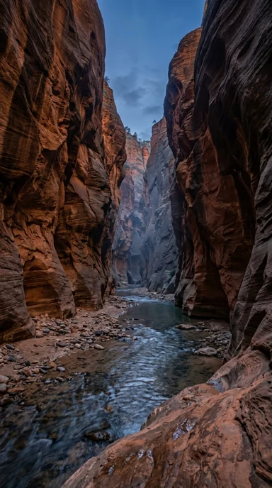Sandstone canyon with a narrow river.