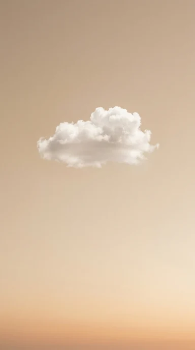 A single white cloud in open sky.