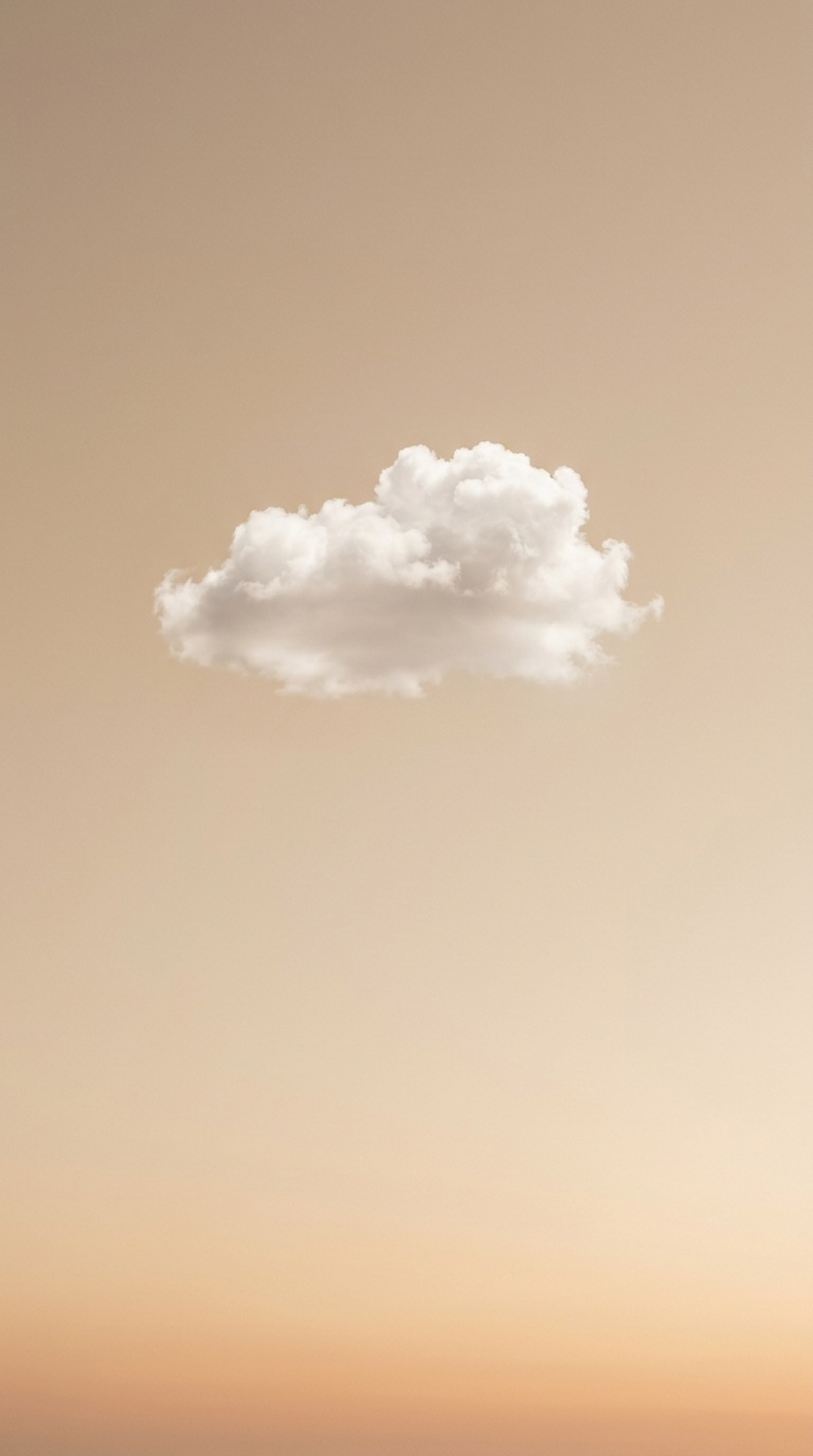 A single white cloud in open sky.