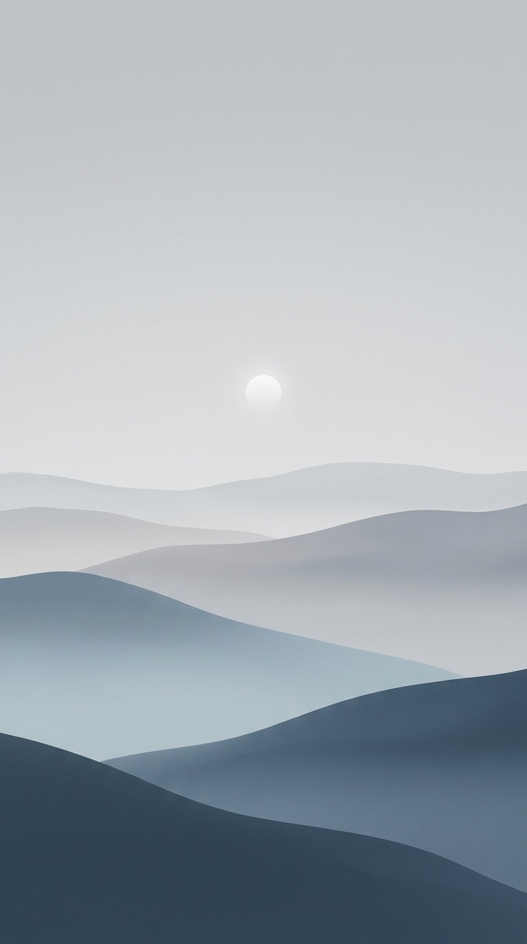 A small sun above layered hills.