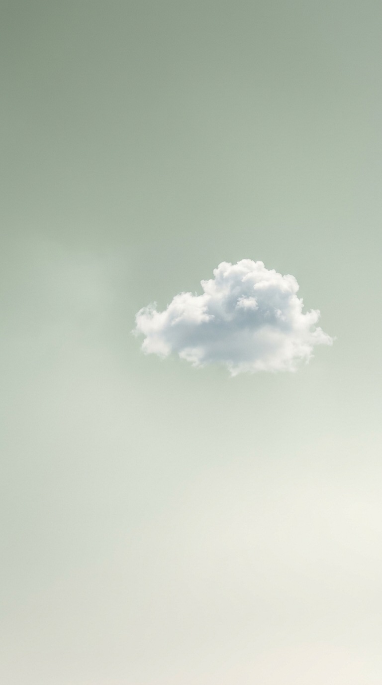 A single white cloud in open sky.